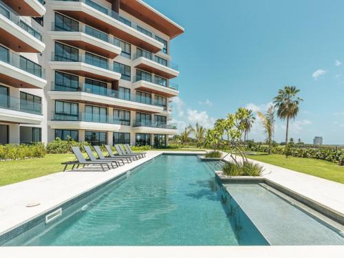 Apartment with balcony and pool view in Cap Cana