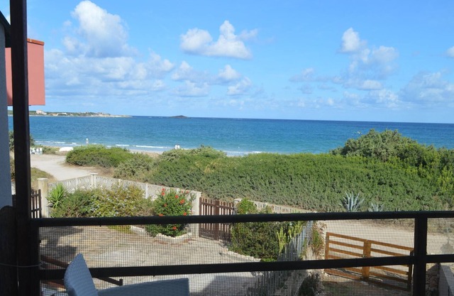 Apartment with veranda overlooking the sea 20 meters from the beach of the locality immersed in the