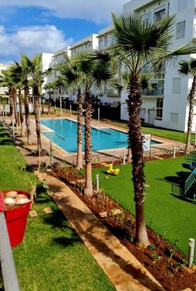 Appartement bouznika kettani avec jardin privé accés direct à la piscine