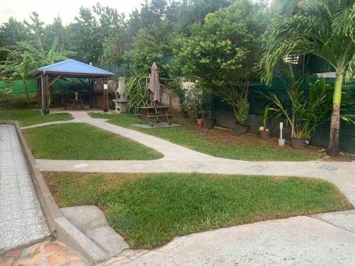 Appartement confortable à Ducos, 37 m², jardin privé