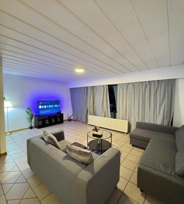 Appartement de Luxe Entièrement Rénové - Proche Aéroport de Bruxelles, Quartier Chic