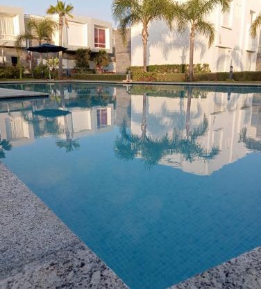 Appartement Familial avec Jardin, Résidence avec Piscine Dar El Bahr