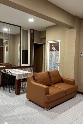Apt 09 Puncak Dharmahusada 3BR Free Wifi Netflix