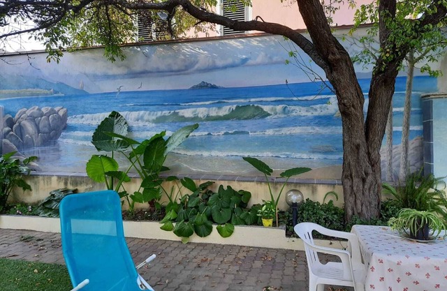 cómodo apartamento ARBATAX TORTOLI con un jardín, viciniss mar