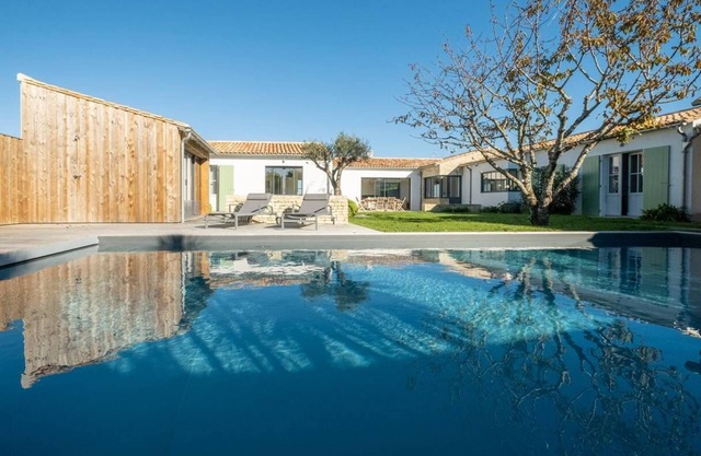 Architect house mansion with heated pool in quiet Loix