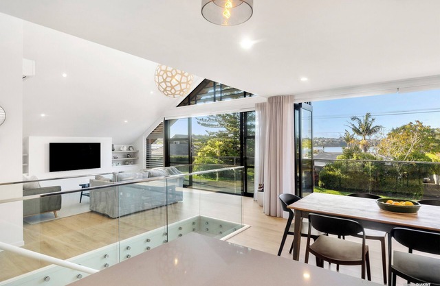 Architecturally designed stunning trophy home with sea views, on a quiet street.