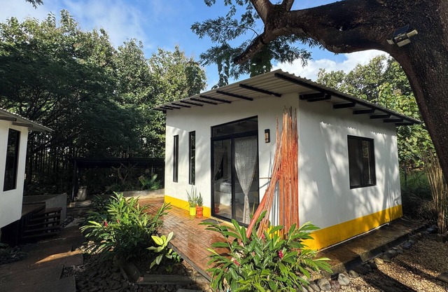 Artist-designed bungalow by the beach in Playa Negra with pool, AC, WiFi