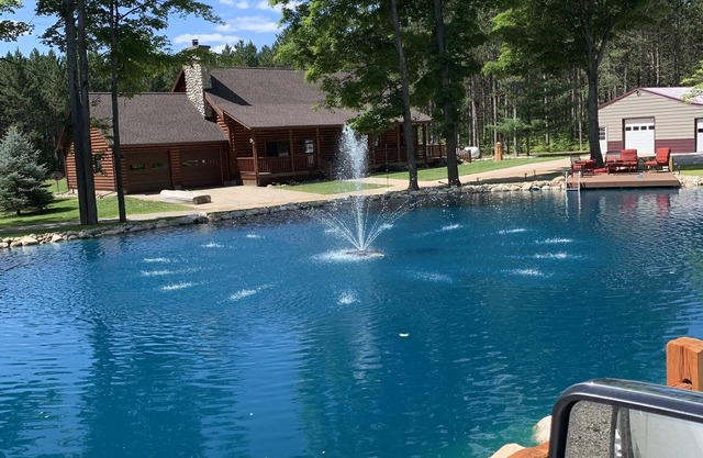 Tall Pines Lodge with private pond.