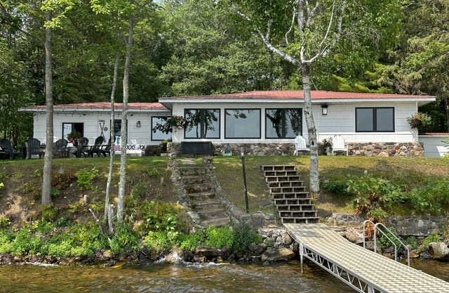 AVAILABLE – Lakefront Retreat: Dock, Designer Kitchen, & Sunrises to Remember.