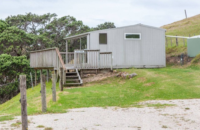 Cabaña básica de vacaciones con su propia bahía de arena privada