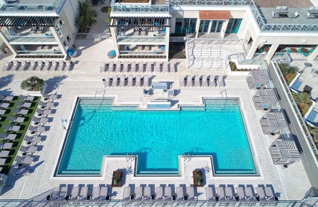 Bask in Modern Style Comfort! 2 City View Units, Beachfront Property w/ Pool