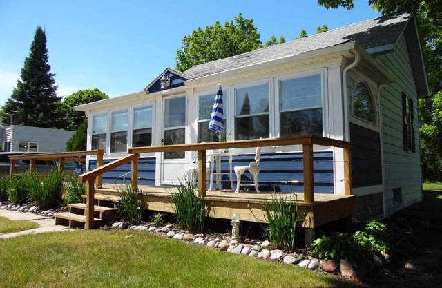 Bay House Location is perfect for a stroll down Newman Street across from Public Lake Huron Beach!