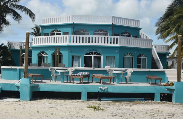 Beach front in welcoming San Pedro w/ AC, pool, fitness room, WiFi, kitchenette