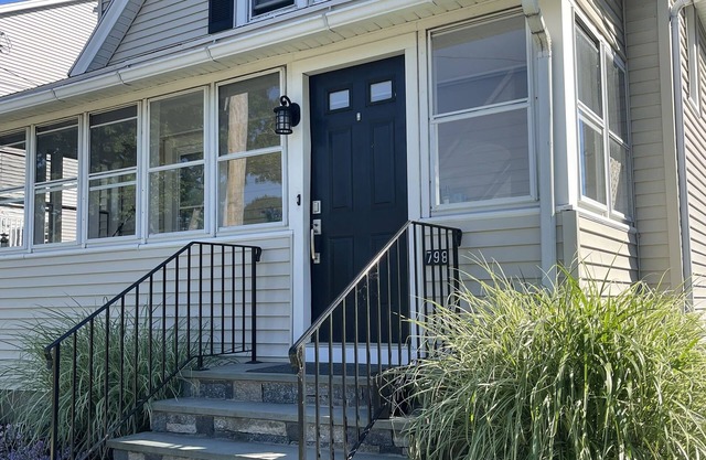 Beach house - perfect location next to beach and town!