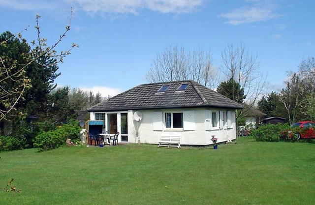 Casa de playa con chimenea bungalow