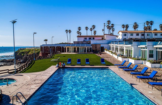 Beach-view dog-friendly villa with private patio, outdoor pool, streaming, AC