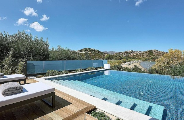 Beachfront 2 bedroom villa with a heated pool