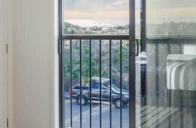 Beachfront 2BR Retreat with Stunning Views
