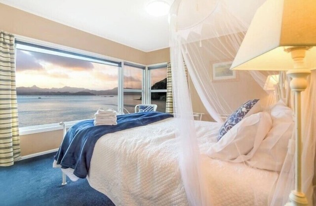 Beachfront Bliss ~ Upper Deck Apartment