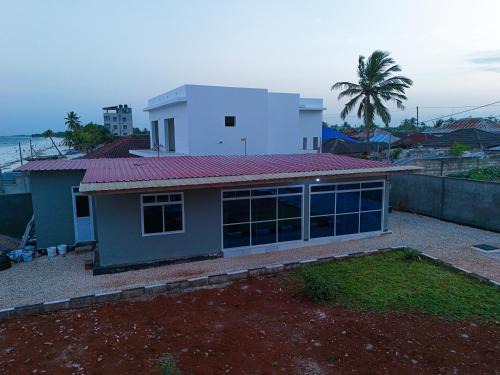Beachfront Bliss Zanzibar - Stylish 1BR Oceanview Apartment in Uroa