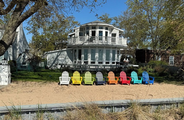 Beachfront Home on Lake Michigan beach. Spectacular sunsets, walk to downtown.