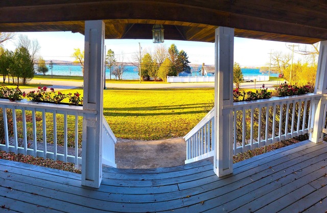 Beachfront home w/dock on Portage Lk. 4 miles to Lk Michigan beach. 4 bdrms.