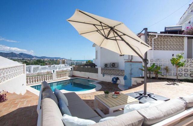 Beachfront villa for 6 in Nerja Punta Lara with private pool, sea and garden views. Mountain view