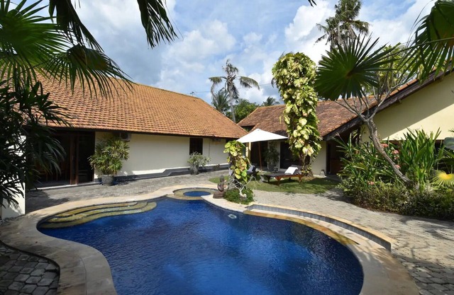Beachfront villa with private pool, garden and terrace