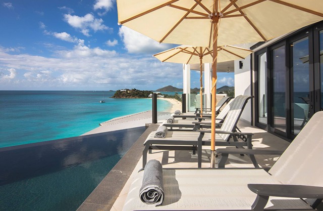 Beachside Villa with 4 Bedrooms, Kitchen, & Living Area with Endless Sea View