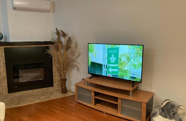 Beautiful 2 bedrooms water front appartement with electric fireplace and a private parking