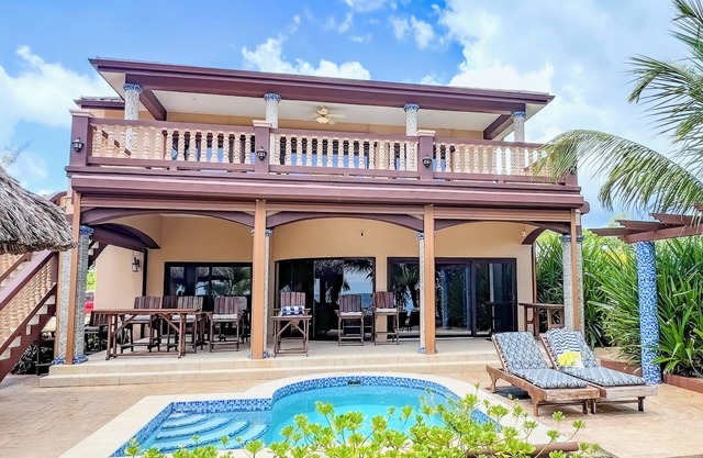 Beautiful 3/3 Beach home on the Caribbean Sea with private pool and dock