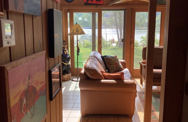 Beautiful 3 bedroom cedar chalet right on Little Traverse Lake, Leelanau County!