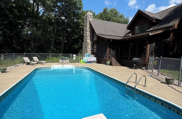 Beautiful 4-BD house with heated in-ground pool,fiber internet and trails!