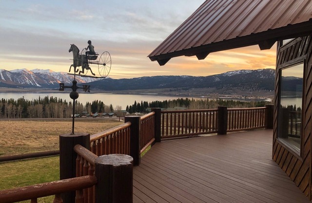 BEAUTIFUL 5 STAR LOG HOME ON 26 ACRES! LAKE VIEWS, STOCKED POND, 18 MILES TO YNP