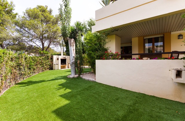 Precioso Apartamento con Jardín y Barbacoa