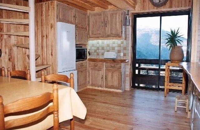 Precioso apartamento en una residencia en madera en las pistas.