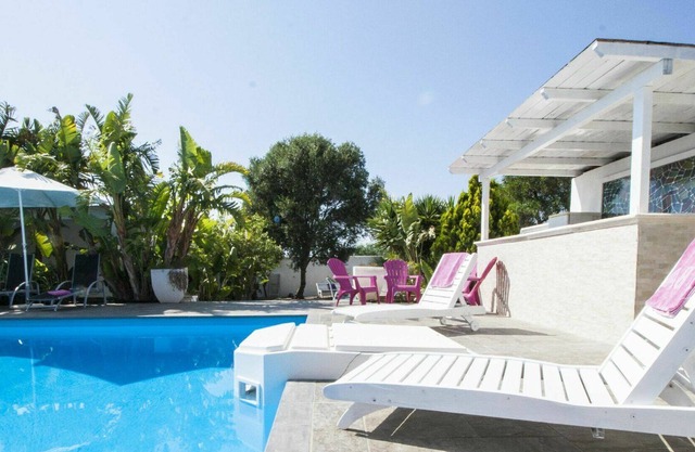 Bonito apartamento en villa para 9 personas con piscina, A/C, WIFI, TV, patio y mascotas permitida