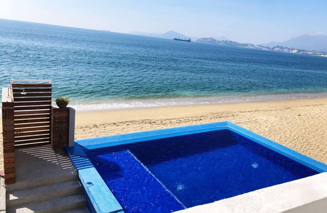 PRECIOSO DEPARTAMENTO A PIE DE PLAYA CON ALBERCA TOTALMENTE NUEVO