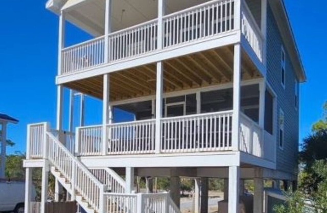 Beautiful beachfront home with private walkway to beach. BOAT PARKING