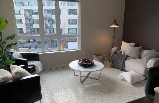 Beautiful & Bright 2 BR corner unit with home office space
