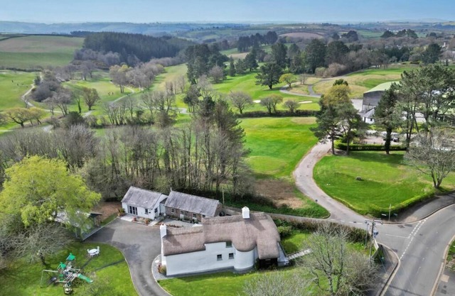 Beautiful character thatched farmhouse overlooking St Mellion golf course