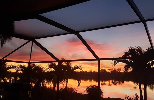 Beautiful completely renovated house with pool on golf course lake with sunsets!