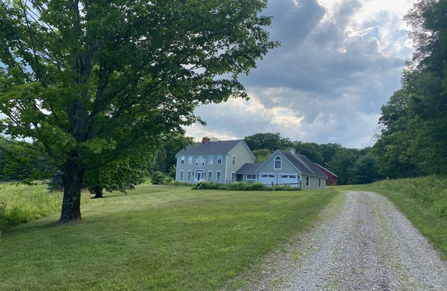 Beautiful home offering privacy on 7 acres with private pond