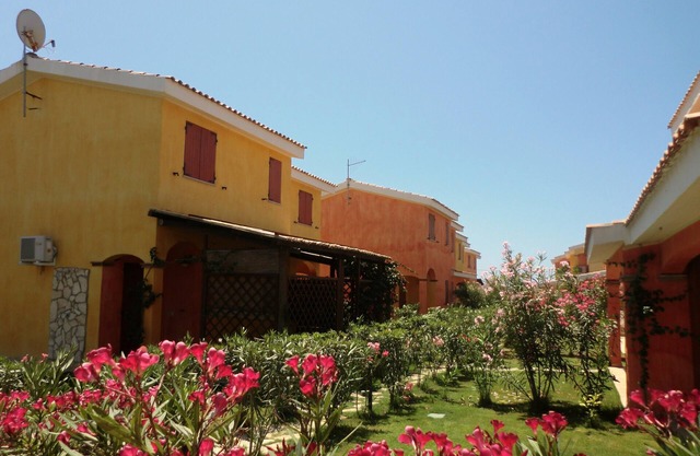 Preciosa casa en Holiday Resort 1 kilometro. Desde Porto Pino