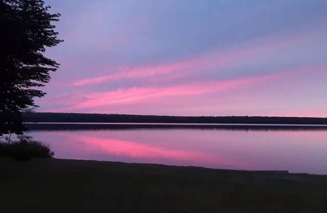 Beautiful Huron Bay sunsets from your own private beach.