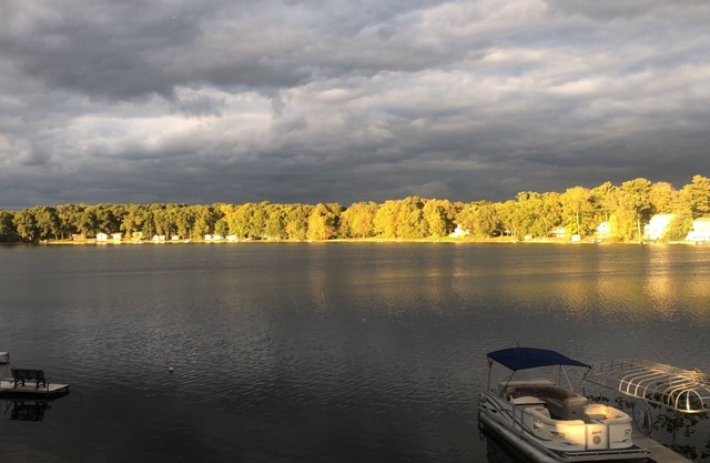 Beautiful Lake House with 150' sandy beach on 85 acre all sports lake