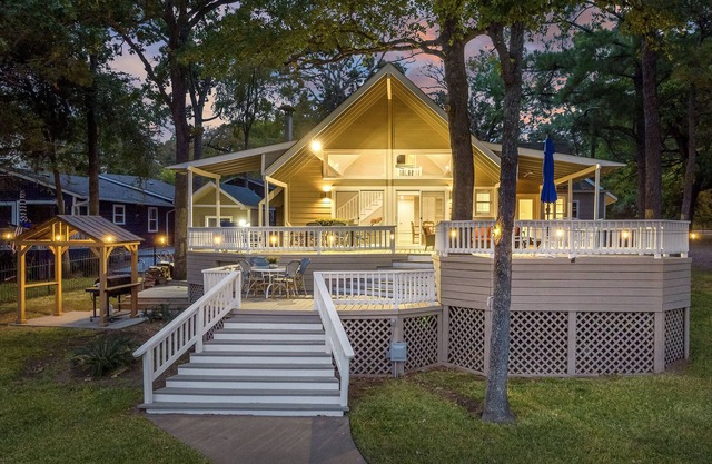 Beautiful lakefront views, boat slip, fire pit, grill gazebo, huge family deck