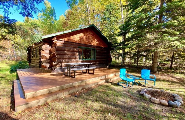 Beautiful log cabin on a private wooded lot