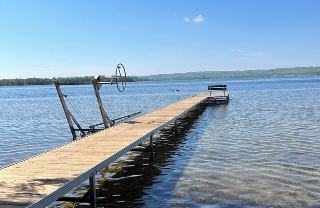 Beautiful modern Petoskey home with lake frontage, dock and boat slip.
