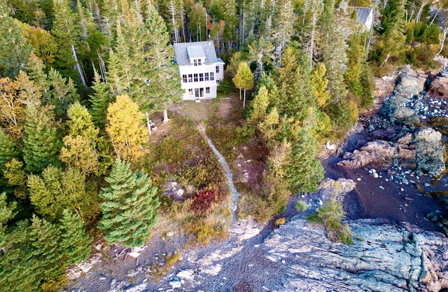 Beautiful ocean-front home, wooded seclusion, private beach on Maine Bold Coast